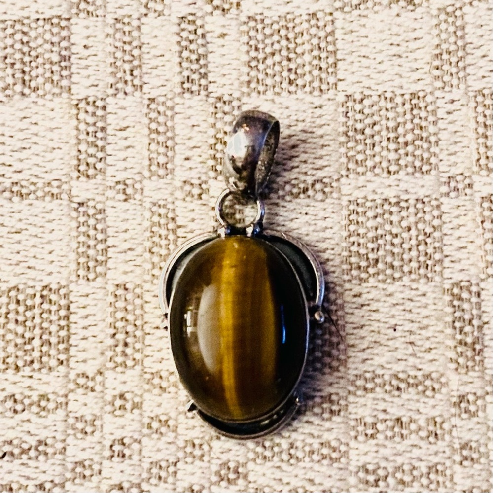 Tiger's Eye gemstone Pendant set in 925 sterling silver.